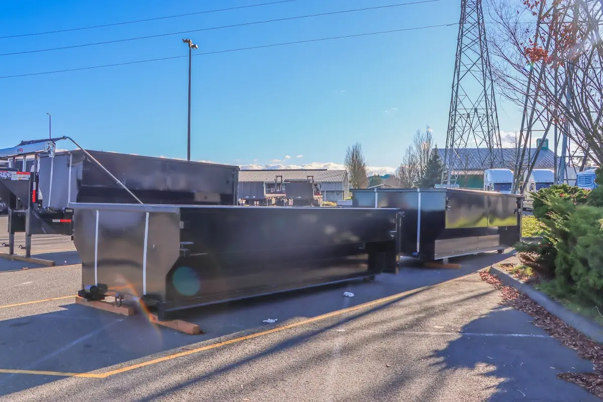 Roll-off dumpster ready for waste disposal at job site for 2 Yard Dumpster Rental in The Pinery